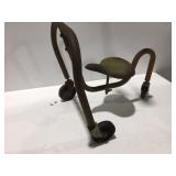 Vintage three wheeled ride on toy