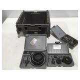 Small tote with holesaw kits, drill, bits, and