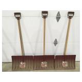 3 plastic snow shovels