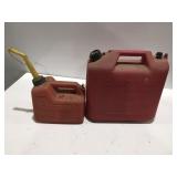 Two plastic fuel containers