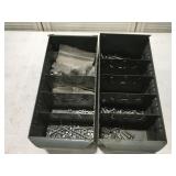 Two metal bins with bolts and nuts