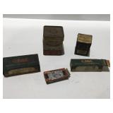 Vintage auto part boxes with contents