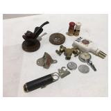 Vintage arrow, fan, lion pipe, and other items