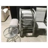 6 outdoor lounge chairs, 2 foot stools, 1 side