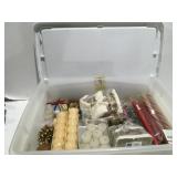 Miscellaneous candles in a tote
