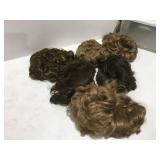 6 wigs in a tote