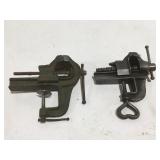 2 small clamp on vises