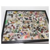 Vintage celluloid charms & more in case