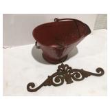 Metal, ash bucket, and metal decor