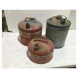 Vintage metal gasoline, cans