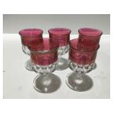 Five cranberry wine glasses