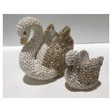 Ceramic, seashell covered swans