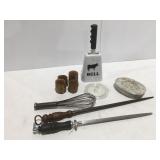 bell, whisk, ashtray, knife, sharpeners