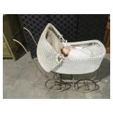 Vintage wicker Baby buggy with baby