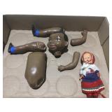 Ceramic baby, doll and plastic doll