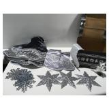 Silver Christmas tree skirt, stockings, and decor