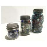 Marbles in vintage canning jars