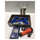 Caulk guns flashlights safety apron
