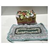 Material strips and small rug