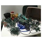 Christmas lights and decor in tote