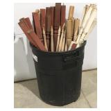 Wood spindles in a trashcan Rubbermaid