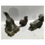 Concrete dog skunk squirrel