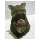 Concrete raccoon missing foot