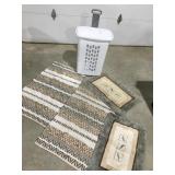 Plastic hamper on wheels with rugs