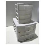 Two plastic storage organizers