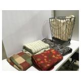 Rolling laundry hamper and blankets