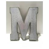Large metal M