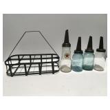 Vintage oil bottles and carrier