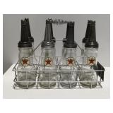 Vintage oil, bottles, and carrier
