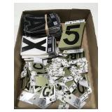Self adhesive letters and numbers