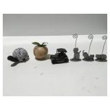 Paper weights, pencil, sharpener, photo holders