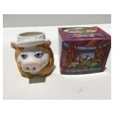 Miss piggy, and Flintstone mug