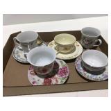 Tea, cups and saucers