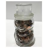 Snowman jar full of pennies