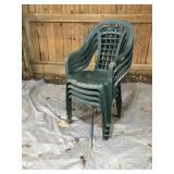 4 green plastic stackable chairs