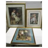 Three large wall hanging pictures