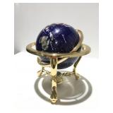 Brass and stone globe with compass