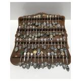 Spoon collectors rack with spoonsRack has some