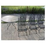 Metal table and chairsHas some damage