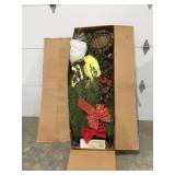 Christmas tree in box with decor