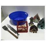 Bird houses, seashells, grilling tools, and tub