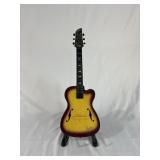 Plastic kids guitar-Needs work