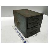 Small metal cabinet with drawers
