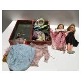 Baby dolls in a case