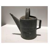 Vintage metal watering can
