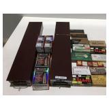 2 metal boxes with empty ammo boxes